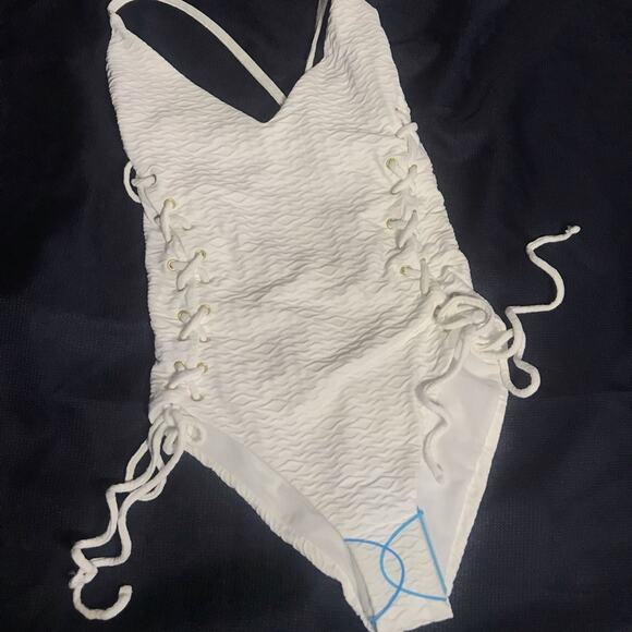 ASOS DESIGN textured lace up swimsuit with… - Picture 3 of 6